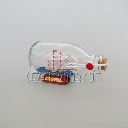 Wooden boat in a glass bottle + BG