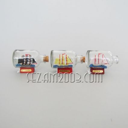 Wooden boat in a glass bottle + BG