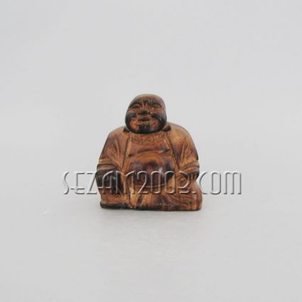 Wooden Buddha sitting