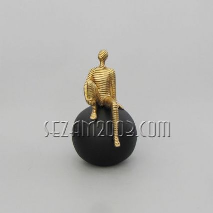 Figure of a person on a sphere – polyresin figurine